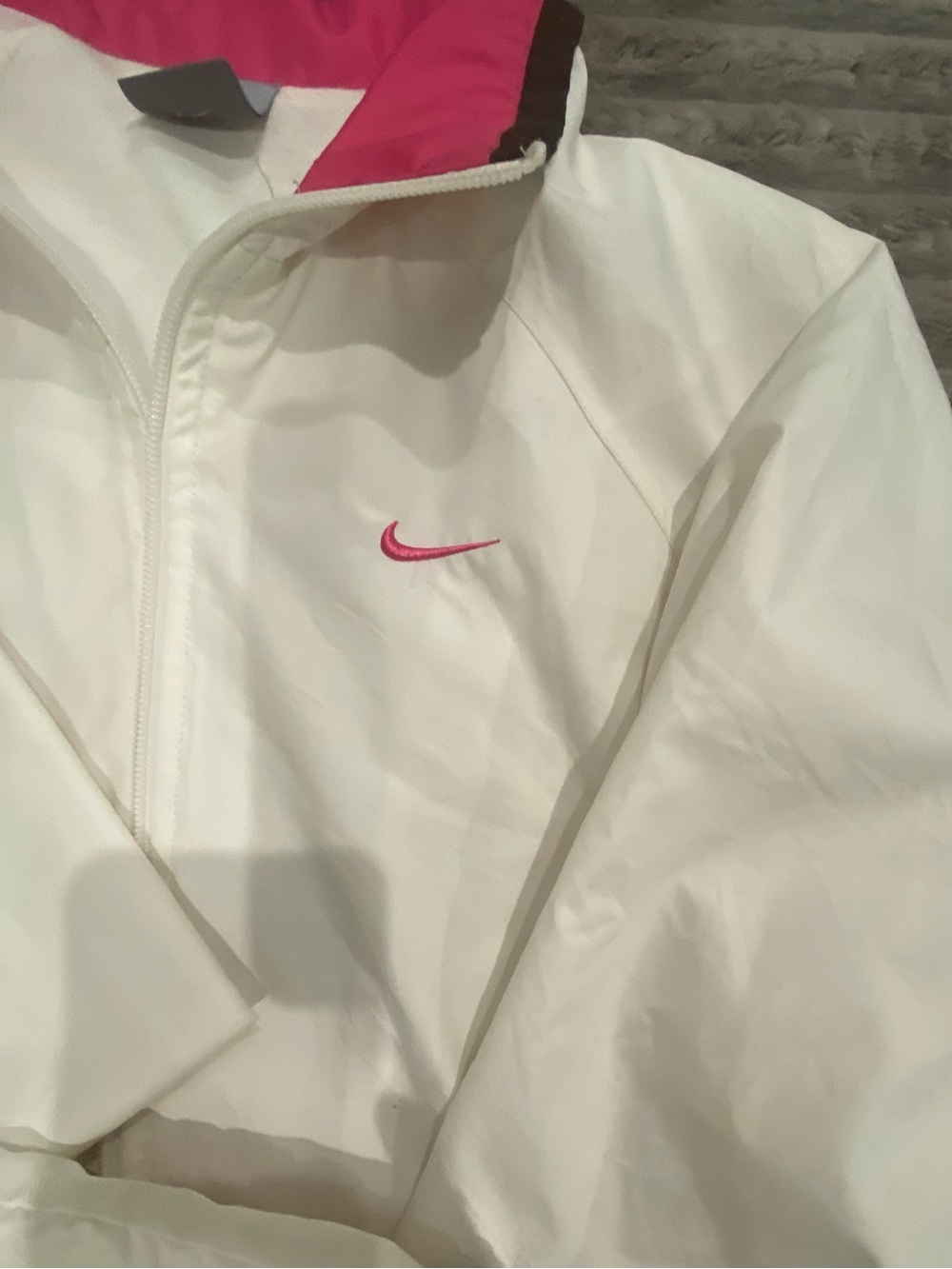 Nike Women’s Off White, Brown, and Pink Jacket and Pant set.